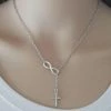 Korting 😉 Lumici® | Heilige Infinity Ketting - Holy Infinity Necklace - Kruis - God - Geloof - Gelovig - Jezus Christus - Oneindig - De Heer - The Lord - Jezus - Cadeau Voor Vrouwen - Moederdag Cadeau - Valentijn - Liefde - Verrassing - Goud & Zilver ⭐